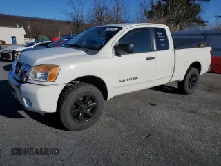 2011 Nissan Titan PRO-4X with VIN 1N6AA0CC8BN314506, listed as a Copart auction lot 82657944 with 118,873 mi miles and Salvage Title. Bid and sale history available at carsss.com. Image 1.