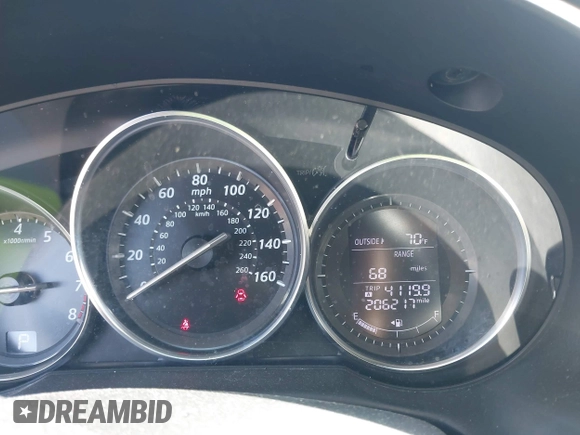 2015 Mazda CX-5 Sport with VIN JM3KE4BY3F0495511, listed as a IAAI auction lot 42170968 with 206,217 mi miles and . Bid and sale history available at carsss.com. Image 7.