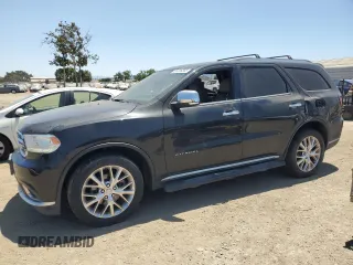 2014 Dodge Durango Citadel with VIN 1C4RDJEG5EC394396, listed as a Copart auction lot 61416305 with 185,730 mi miles and Salvage title. Bid and sale history available at DreamBid. Image 1.