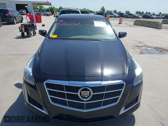 2014 Cadillac CTS Luxury RWD z VIN 1G6AR5SX3E0196348, wystawiony jako IAAI lot #42282732 z przebiegiem 130 956 mil mil oraz . Historia ofert i sprzedaży dostępna na DreamBid. Obrazek 6.