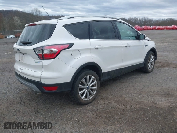 2018 Ford Escape Titanium with VIN 1FMCU9J90JUD53380, listed as a IAAI auction lot 42042802 with 30,371 mi miles and . Bid and sale history available at DreamBid. Image 4.