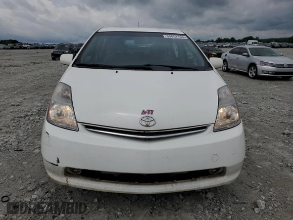 2006 Toyota Prius z VIN JTDKB20U867527026, wystawiony jako Copart lot #59057765 z przebiegiem 248 523 mil mil oraz Nie do naprawy • Non repairable. Historia ofert i sprzedaży dostępna na DreamBid. Obrazek 5.