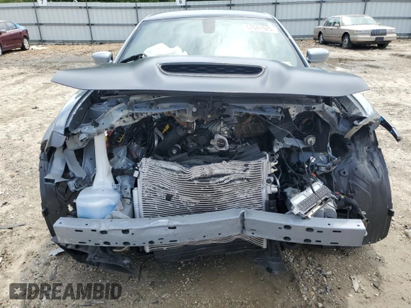2021 Dodge Charger SRT Hellcat Widebody z VIN 2C3CDXL97MH603070, wystawiony jako Copart lot #57661925 z przebiegiem Nie podano mil oraz Szkoda całkowita • Salvage title. Historia ofert i sprzedaży dostępna na DreamBid. Obrazek 5.