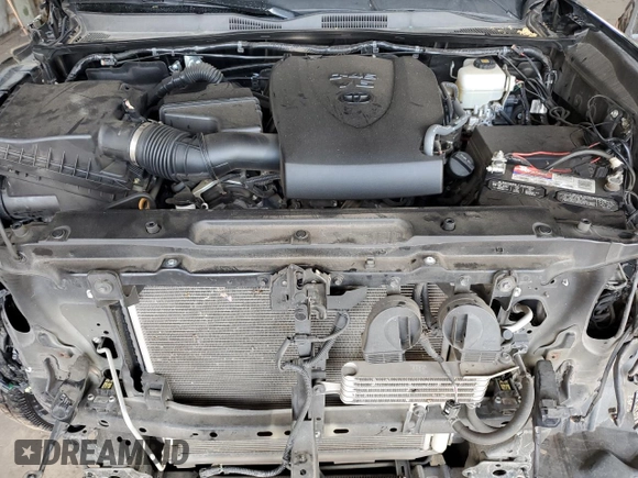 2020 Toyota Tacoma SR5 z VIN 5TFCZ5AN0LX229364, wystawiony jako Copart lot #55695505 z przebiegiem 69 908 mil mil oraz Szkoda całkowita • Salvage title. Historia ofert i sprzedaży dostępna na DreamBid. Obrazek 11.