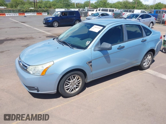 2008 Ford Focus SE with VIN 1FAHP35N28W224406, listed as a IAAI auction lot 41861020 with 127,025 mi miles. Bid and sale history available at carsss.com. Image 2.