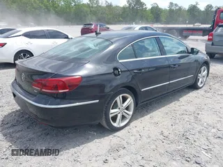 2013 Volkswagen CC Lux with VIN WVWRP7AN2DE525995, listed as a IAAI auction lot 42105042 with 148,818 mi miles. Bid and sale history available at carsss.com. Image 4.