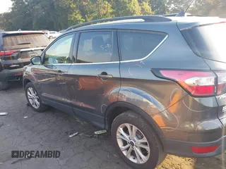 2018 Ford Escape SEL with VIN 1FMCU9HD0JUC25036, listed as a IAAI auction lot 40518589 with 143,076 mi miles. Bid and sale history available at carsss.com. Image 14.