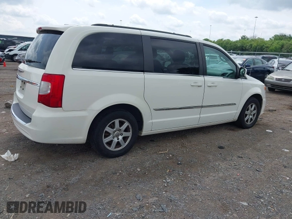 2011 Chrysler Town & Country Touring with VIN 2A4RR5DG9BR775238, listed as a IAAI auction lot 42162442 with 180,408 mi miles and . Bid and sale history available at DreamBid. Image 4.