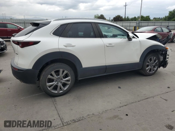 2022 Mazda CX-30 S Select with VIN 3MVDMBBL9NM411859, listed as a Copart auction lot 59875745 with 52,878 mi miles and Salvage title. Bid and sale history available at DreamBid. Image 3.