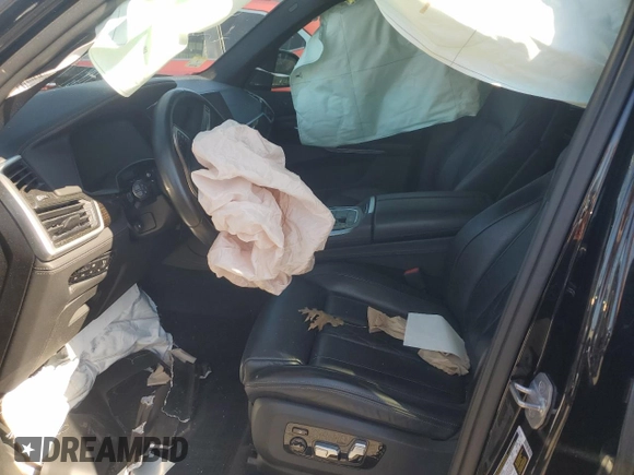 2020 BMW X5 M50i with VIN 5UXJU4C05LL228167, listed as a Copart auction lot 70390194 with Not Provided miles and Salvage Title. Bid and sale history available at DreamBid. Image 7.