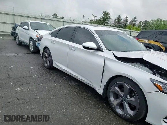 2018 Honda Accord Touring z VIN 1HGCV2F9XJA042690, wystawiony jako Copart lot #57122025 z przebiegiem 55 364 mil mil oraz Szkoda całkowita • Salvage title. Historia ofert i sprzedaży dostępna na DreamBid. Obrazek 14.