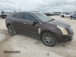 2015 Cadillac SRX Performance Collection with VIN 3GYFNCE38FS571733, listed as a Copart auction lot 54946215 with 147,343 mi miles and Salvage title. Bid and sale history available at DreamBid. Image 4.