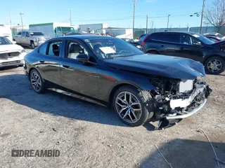2024 BMW i5 eDrive40 with VIN WBY33FK00RCP37858, listed as a IAAI auction lot 41016747 with 1 mi miles. Bid and sale history available at carsss.com. Image 1.