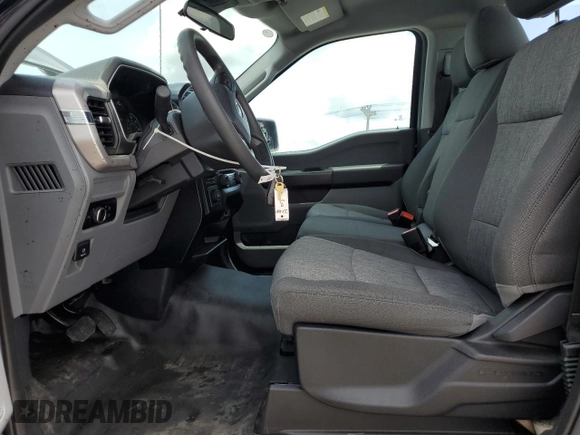2023 Ford F-150 XL with VIN 1FTMF1CB3PKF58099, listed as a Copart auction lot 61974605 with 12,193 mi miles and Non repairable. Bid and sale history available at DreamBid. Image 7.