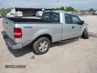 2005 Ford F-150 STX with VIN 1FTRX14W55FA69973, listed as a IAAI auction lot 42080948 with 250,000 mi miles and . Bid and sale history available at carsss.com. Image 4.