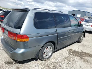2000 Honda Odyssey EX with VIN 2HKRL1860YH532814, listed as a Copart auction lot 51780855 with 186,328 mi miles and Salvage Title. Bid and sale history available at DreamBid. Image 3.