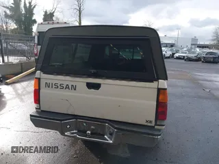 1997 Nissan Frontier XE with VIN 1N6SD16S1VC351353, listed as a IAAI auction lot 41623370 with 198,230 mi miles and . Bid and sale history available at DreamBid. Image 16.
