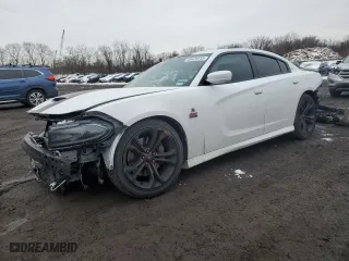 2019 Dodge Charger Scat Pack with VIN 2C3CDXGJ7KH579211, listed as a Copart auction lot 44421915 with 74,672 mi miles and Salvage Title. Bid and sale history available at carsss.com. Image 1.