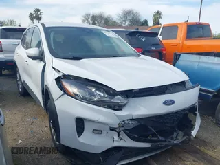 2021 Ford Escape SE Hybrid z VIN 1FMCU9BZ7MUB03055, wystawiony jako IAAI lot #41700370 z przebiegiem 66 128 mil mil oraz . Historia ofert i sprzedaży dostępna na DreamBid. Obrazek 1.