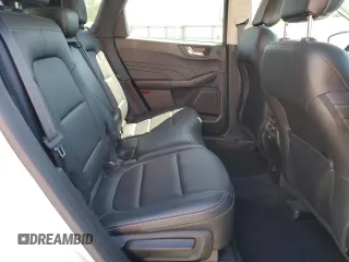 2021 Ford Escape Titanium Hybrid z VIN 1FMCU0DZ5MUB04522, wystawiony jako Copart lot #49127385 z przebiegiem 66 996 mil mil oraz Szkody całkowita. Historia ofert i sprzedaży dostępna na DreamBid. Obrazek 11.