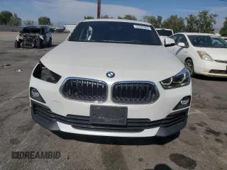 2018 BMW X2 sDrive28i with VIN WBXYJ3C34JEJ84163, listed as a Copart auction lot 54043904 with 46,509 mi miles and Salvage title. Bid and sale history available at DreamBid. Image 5.