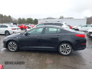 2015 Kia Optima SX Turbo with VIN 5XXGR4A65FG406037, listed as a IAAI auction lot 41975555 with 100,468 mi miles. Bid and sale history available at carsss.com. Image 15.