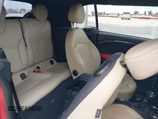 2014 MINI Convertible S z VIN WMWZP3C56ET707702, wystawiony jako IAAI lot #42431046 z przebiegiem 65 726 mil mil oraz . Historia ofert i sprzedaży dostępna na DreamBid. Obrazek 8.