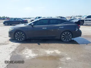 2016 Nissan Maxima SR z VIN 1N4AA6AP0GC400686, wystawiony jako IAAI lot #42378284 z przebiegiem 139 996 mil mil oraz . Historia ofert i sprzedaży dostępna na DreamBid. Obrazek 14.