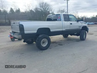 2001 Dodge 2500 with VIN 1B7KF23641J597636, listed as a IAAI auction lot 41843898 with 257,007 mi miles. Bid and sale history available at carsss.com. Image 4.