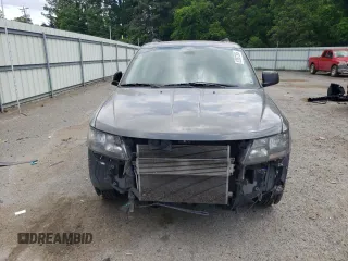 2019 Dodge Journey SE with VIN 3C4PDCBB0KT875474, listed as a Copart auction lot 52987395 with 76,816 mi miles and Salvage Title. Bid and sale history available at DreamBid. Image 5.