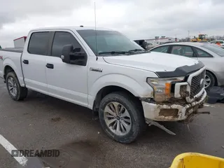 2018 Ford F-150 XL with VIN 1FTEW1E59JKD99284, listed as a IAAI auction lot 41203530 with 153,800 mi miles. Bid and sale history available at carsss.com. Image 1.