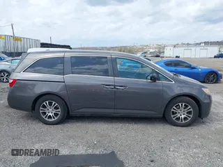 2013 Honda Odyssey EX-L with VIN 5FNRL5H63DB034963, listed as a IAAI auction lot 41921431 with 163,609 mi miles and . Bid and sale history available at DreamBid. Image 13.