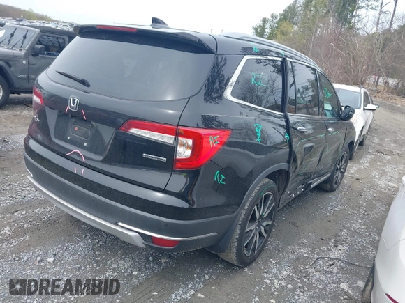 2019 Honda Pilot Touring 7-Passenger z VIN 5FNYF5H66KB027960, wystawiony jako IAAI lot #41863212 z przebiegiem 114 615 mil mil oraz . Historia ofert i sprzedaży dostępna na DreamBid. Obrazek 4.