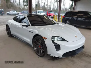 2021 Porsche Taycan Turbo z VIN WP0AC2Y15MSA62964, wystawiony jako IAAI lot #41712993 z przebiegiem 20 972 mil mil oraz . Historia ofert i sprzedaży dostępna na DreamBid. Obrazek 1.