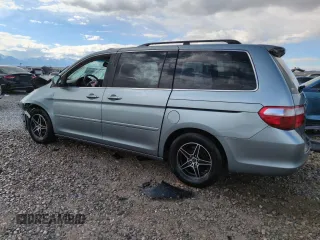 2005 Honda Odyssey Touring z VIN 5FNRL38855B051447, wystawiony jako Copart lot #57144925 z przebiegiem 186 476 mil mil oraz Szkoda całkowita • Salvage title. Historia ofert i sprzedaży dostępna na DreamBid. Obrazek 2.