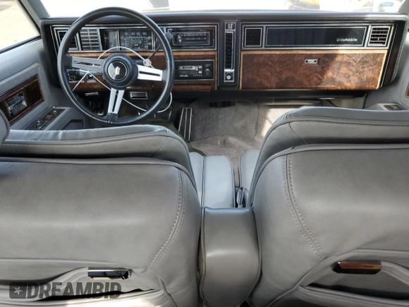 1982 Oldsmobile Toronado with VIN 1G3AZ57Y5CE325589, listed as a Copart auction lot 47707135 with 99,044 mi miles and Clean Title. Bid and sale history available at DreamBid. Image 8.