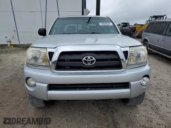2011 Toyota Tacoma PreRunner with VIN 3TMJU4GN6BM123030, listed as a Copart auction lot 74906634 with 212,794 mi miles and Salvage Title. Bid and sale history available at DreamBid. Image 5.