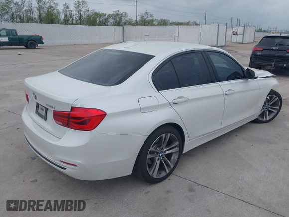 2017 BMW 3 Series 330i with VIN WBA8B9G51HNU09431, listed as a IAAI auction lot 41869627 with 87,719 mi miles. Bid and sale history available at carsss.com. Image 4.