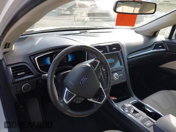 2017 Ford Fusion Hybrid Titanium с VIN 3FA6P0RU7HR148191, выставлен на аукционе IAAI как лот 42167708 с пробегом 72 708 миль миль и . История ставок и продаж доступна на DreamBid. Изображение 20.