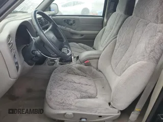 1998 GMC Jimmy SL with VIN 1GKCS13W8W2572514, listed as a Copart auction lot 83016224 with 85,044 mi miles and Salvage Title. Bid and sale history available at carsss.com. Image 7.
