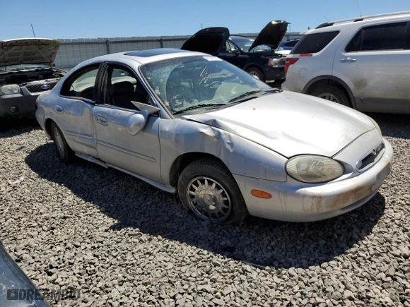 1996 Mercury Sable LS with VIN 1MELM53S4TG634577, listed as a Copart auction lot 61707733 with 76,781 mi miles and Salvage Title. Bid and sale history available at carsss.com. Image 4.