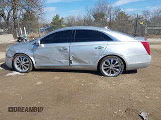 2013 Cadillac XTS Luxury with VIN 2G61R5S34D9233991, listed as a IAAI auction lot 41825533 with 152,706 mi miles. Bid and sale history available at carsss.com. Image 14.