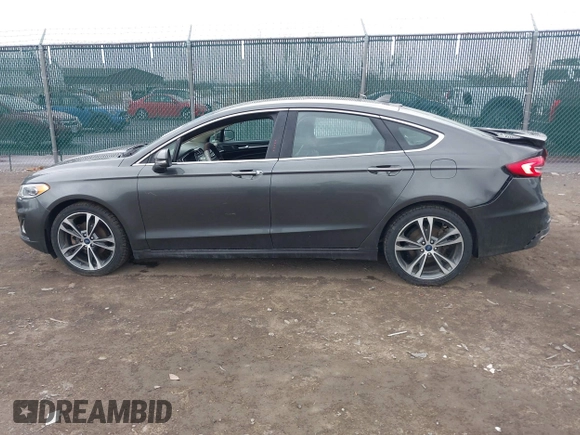 2019 Ford Fusion Titanium with VIN 3FA6P0K9XKR259556, listed as a IAAI auction lot 41823997 with 132,071 mi miles. Bid and sale history available at carsss.com. Image 14.