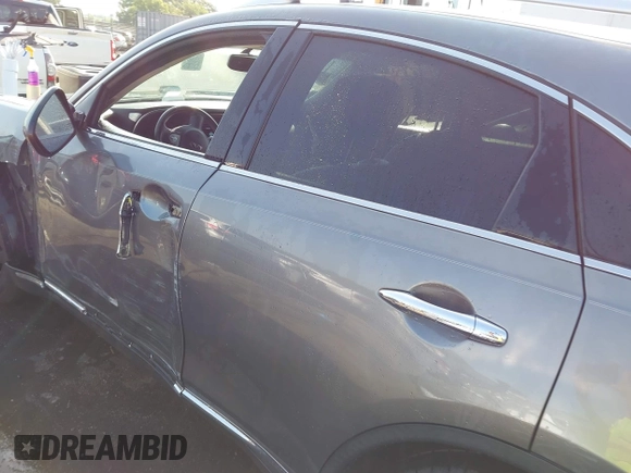 2017 Infiniti QX70 z VIN JN8CS1MW4HM410322, wystawiony jako IAAI lot #42285313 z przebiegiem 126 031 mil mil oraz . Historia ofert i sprzedaży dostępna na DreamBid. Obrazek 14.