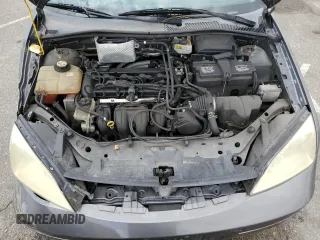 2006 Ford Focus S z VIN 1FAFP37N76W182882, wystawiony jako Copart lot #56939295 z przebiegiem 136 831 mil mil oraz Szkoda całkowita • Salvage title. Historia ofert i sprzedaży dostępna na DreamBid. Obrazek 11.