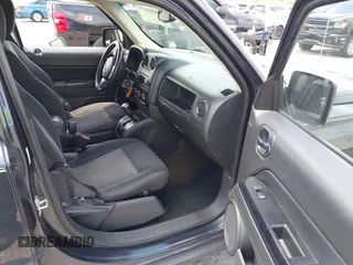 2014 Jeep Patriot Latitude with VIN 1C4NJPFA4ED604145, listed as a IAAI auction lot 42091619 with 81,119 mi miles and . Bid and sale history available at carsss.com. Image 5.