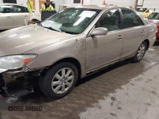 2003 Toyota Camry LE with VIN 4T1BE32K73U136399, listed as a IAAI auction lot 41877554 with 235,078 mi miles and . Bid and sale history available at DreamBid. Image 6.