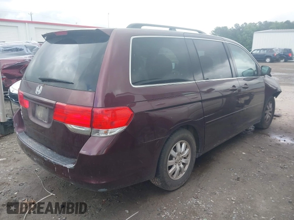 2010 Honda Odyssey EX with VIN 5FNRL3H45AB044845, listed as a IAAI auction lot 42353739 with 289,376 mi miles and . Bid and sale history available at DreamBid. Image 4.