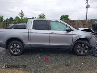 2017 Honda Ridgeline RTL with VIN 5FPYK3F52HB019266, listed as a IAAI auction lot 42638081 with 117,004 mi miles and . Bid and sale history available at DreamBid. Image 13.