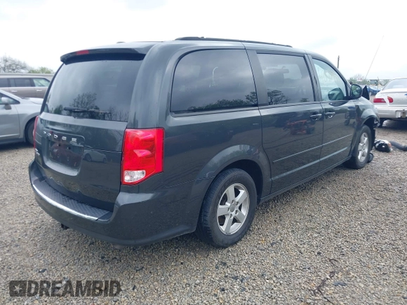 2012 Dodge Grand Caravan SXT with VIN 2C4RDGCG7CR236328, listed as a IAAI auction lot 42170991 with 72,831 mi miles and . Bid and sale history available at DreamBid. Image 4.